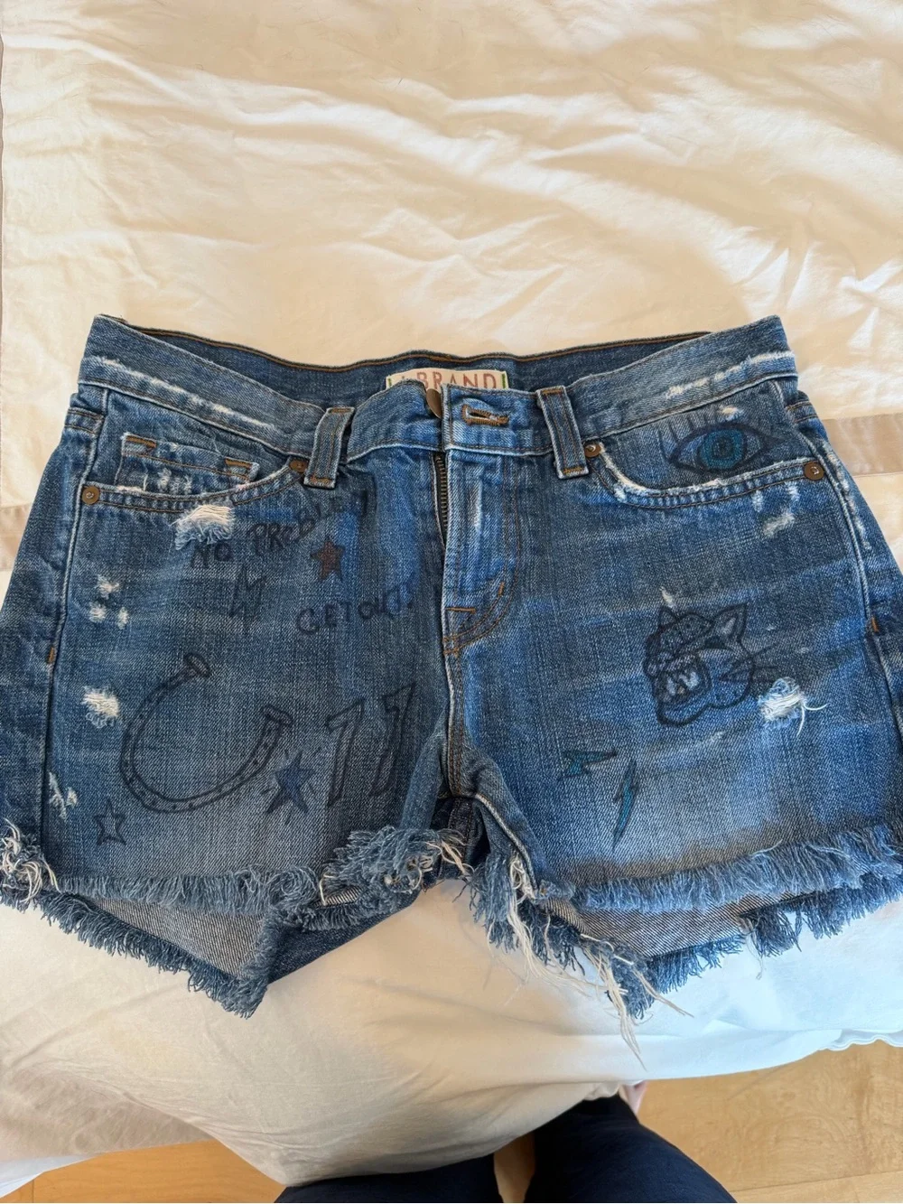J Brand Distressed Blue Denim Shorts with Printed Graphics